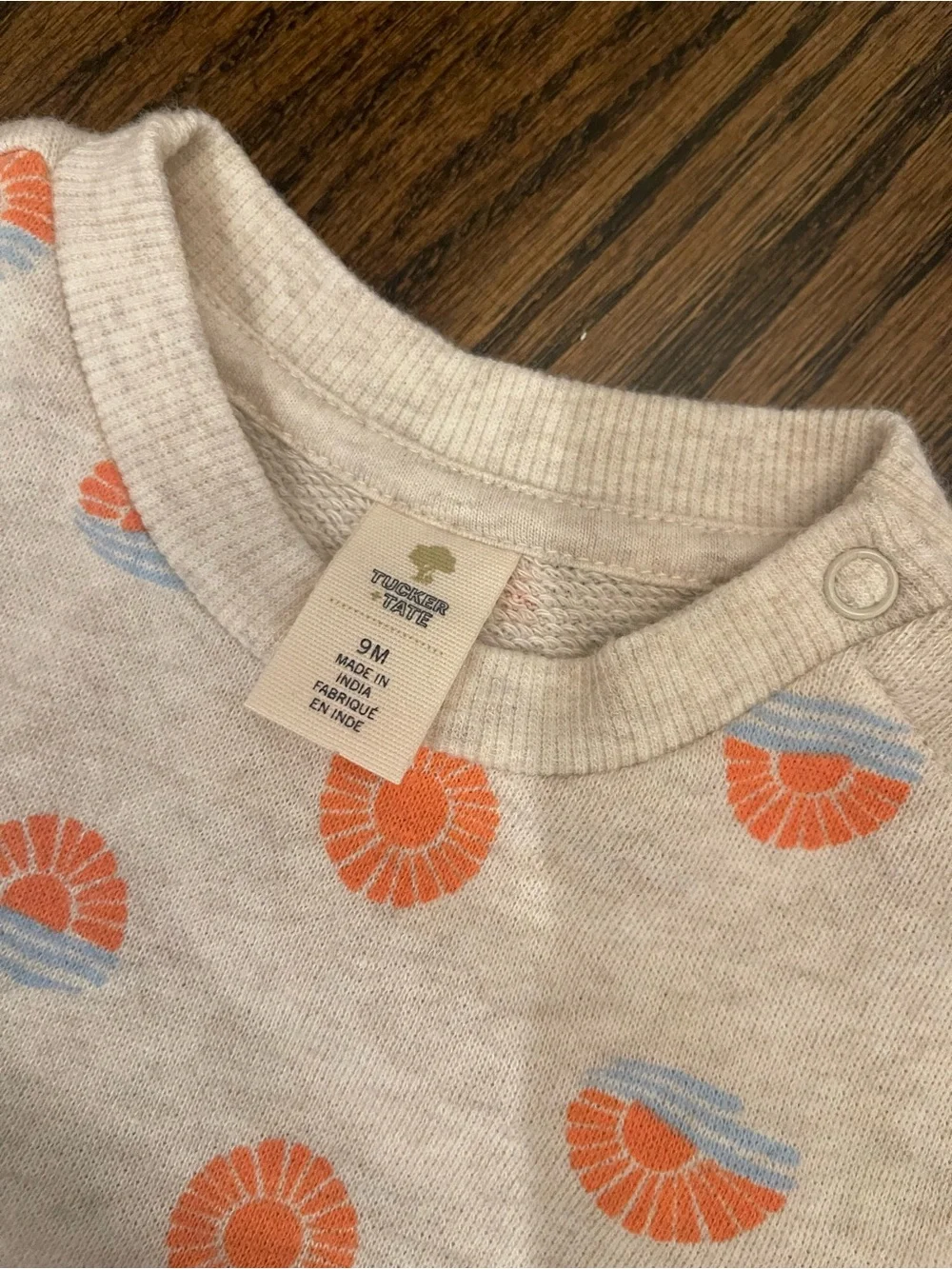 Neutral Baby Sweatshirt & Pants Set with Orange Sun Motif
